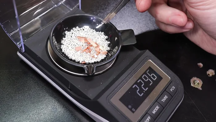 Add Flux: Sprinkle a small amount of borax (flux) into the crucible. This helps with melting and prevents impurities.