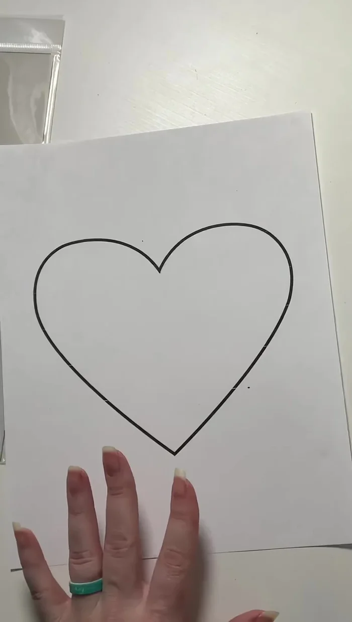 Prepare your image: Print or trace your desired design onto paper. Symmetry can simplify the process; you might only need to design one half if the image is symmetrical.