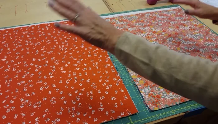 Cut the fabrics according to the pattern instructions (measurements vary depending on desired quilt size).