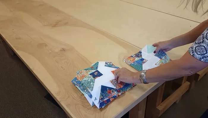 Sew the quilt top together.