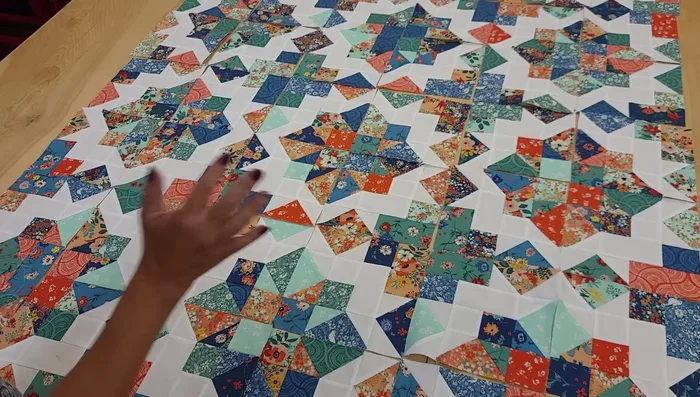 Sew the quilt top together.