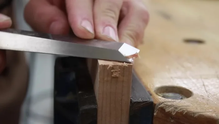 Pare the spline flush with a saw and chisel or plane.