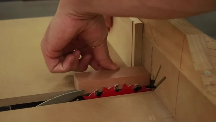 Remove half the material from both faces of the wood pieces.