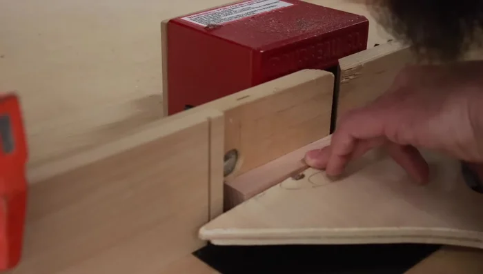 Cut rabbets, ensuring a stopped cut for the bottom piece.