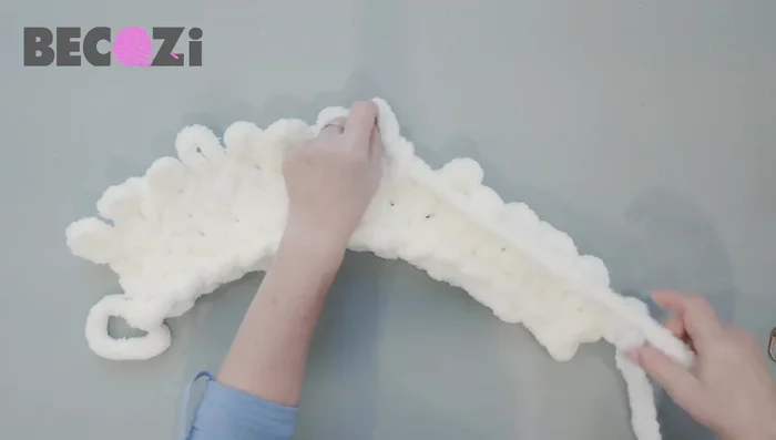 Knitting the body: Knit for approximately 55 inches (adjust based on desired length and gauge).