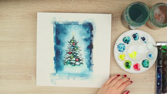 Remove tape and make final touches – adjusting colors, adding details, and making final adjustments to the snow and lights.