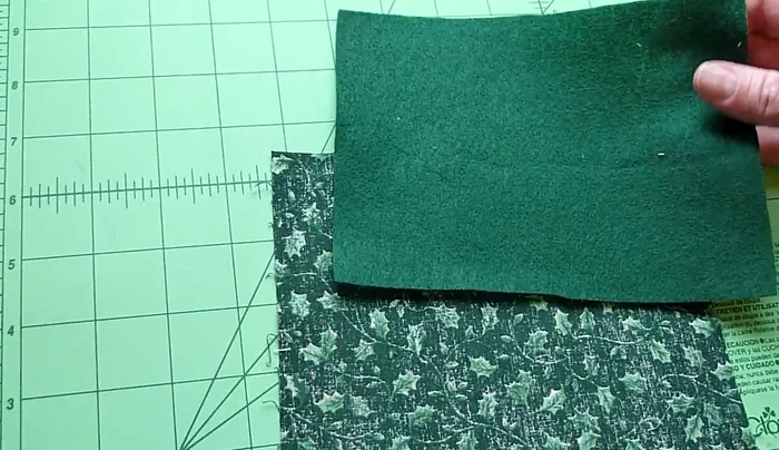 Prepare your materials: Lay backing fabric (right side down), felt on top. 