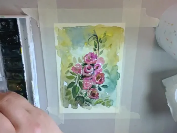 Balance the composition and draw the viewer's eye to the center of the card.