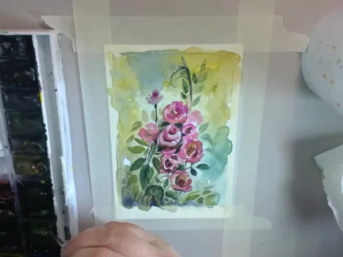 Balance the composition and draw the viewer's eye to the center of the card.