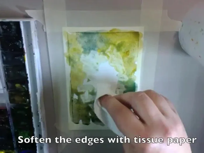 Leave the center of the page white and soften the edges with tissue paper.