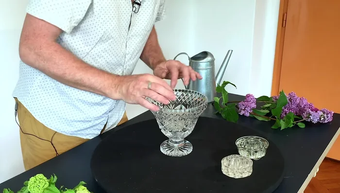 Select the appropriate base: Choose a crystal bowl with numerous holes for better flower placement and stability.