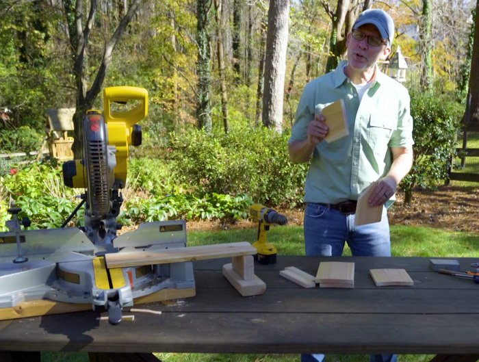 Attach the narrow roof piece, followed by the wider roof piece.