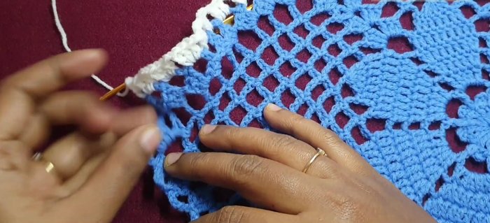 Continuing the pattern around to complete the first round.