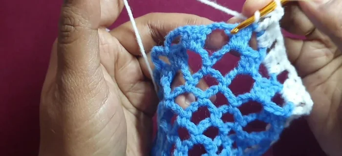 Continuing the pattern around to complete the first round.