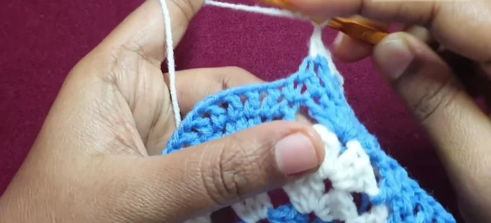 Finishing the edging: Make front post double crochets on each corner double crochet, chain one, single crochet between the first two double crochets. Repeat around. Fasten off.