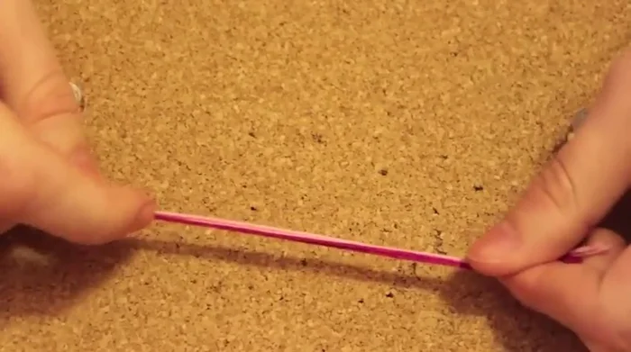 Create the tassels: Wrap embroidery floss around two pins, the more wraps, the thicker the tassel.