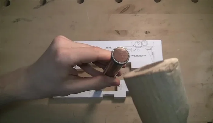 Use a dado stack at the table saw to create the wine shaft support.