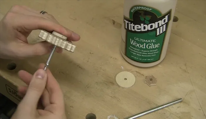 Assemble the intermediate wheel, spacer, and pinion; the third wheel, spacer, and pinion; and the escape wheel, spacer, and pinion assemblies. Insert brass tubes using an arbor press.