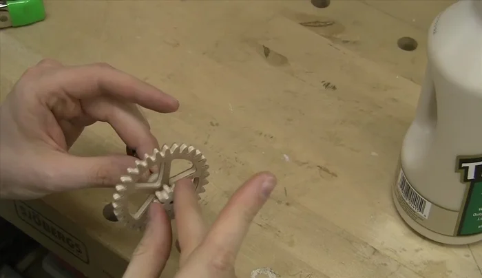 Assemble the intermediate wheel, spacer, and pinion; the third wheel, spacer, and pinion; and the escape wheel, spacer, and pinion assemblies. Insert brass tubes using an arbor press.