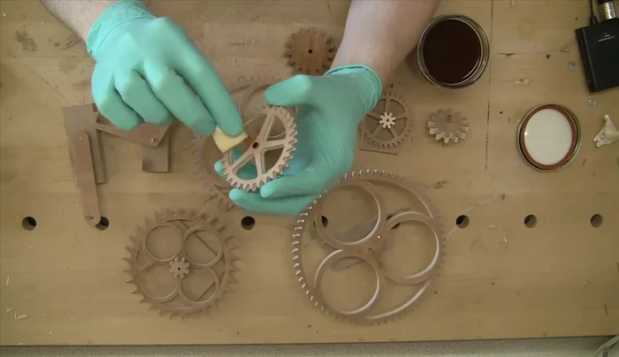 Assemble the clock, add a weight, and adjust the pendulum for optimal performance.