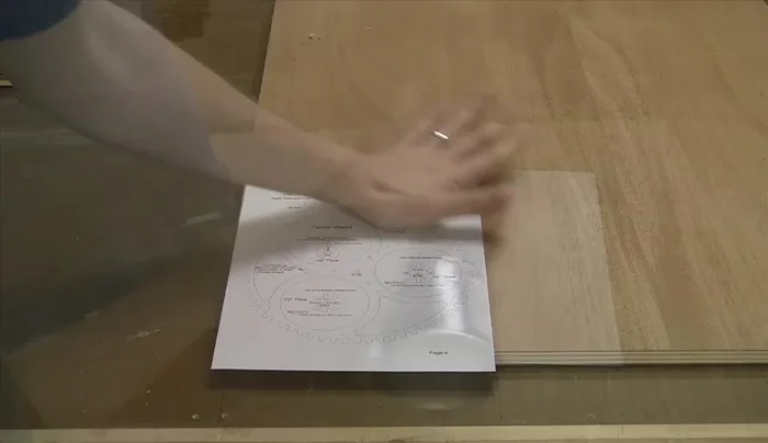 Drill holes and countersinks for the cannon pinion, ensuring concentricity.