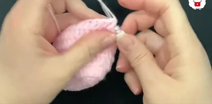 Rows eight and nine: Chain 2. Make double crochets around (30 double crochets).