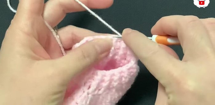 Rows eight and nine: Chain 2. Make double crochets around (30 double crochets).