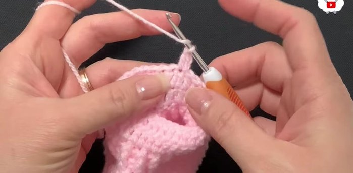 Row eleven: Chain 2. Make double crochets around (28 double crochets).