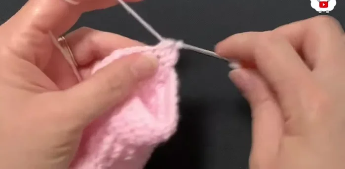 Row eleven: Chain 2. Make double crochets around (28 double crochets).