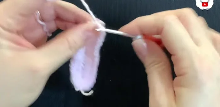 Make 7 double crochets into the last chain, and then join with a slip stitch to finish the first row (total of 42 double crochets).