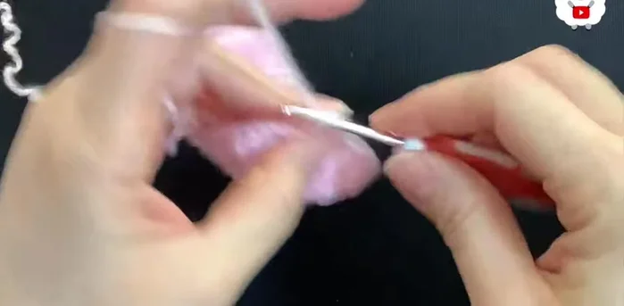 Chain 2 for the second row. Make double crochets around (56 double crochets), joining with a slip stitch.