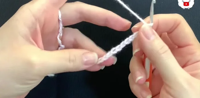 Make 7 double crochets into the last chain, and then join with a slip stitch to finish the first row (total of 42 double crochets).