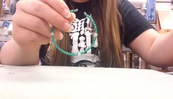 Repeat steps 3 and 4 to create five more strands of beads.