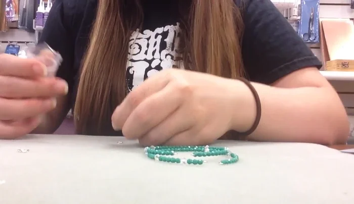 Join each pair of strand ends using small jump rings. Open the jump rings at the 12 o'clock position and close them carefully to avoid damage.