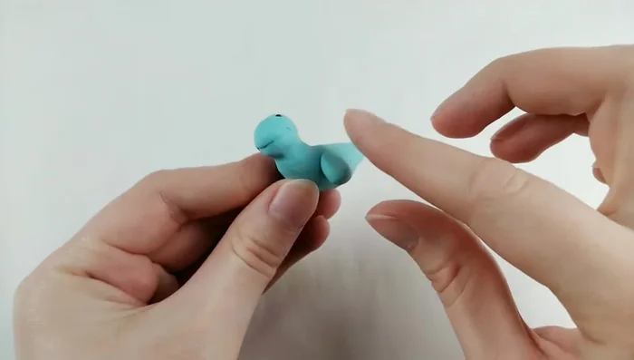 Add legs, blending them in using a Q-tip dipped in acetone.