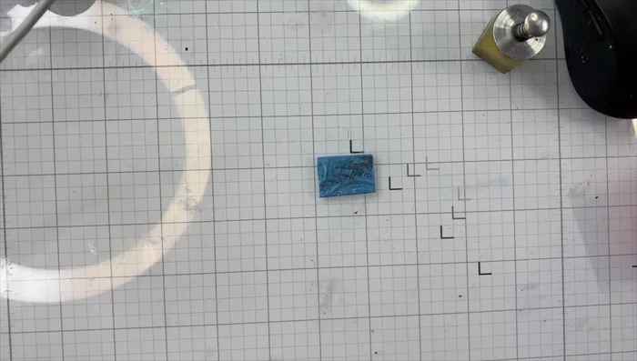 Seal the tiles: Apply a water-based sealer designed for polymer clay (Quick Shine Multi-Surface Floor Finish recommended) using a makeup brush. Let dry completely, optionally using a heat gun or hair dryer to speed up the process.