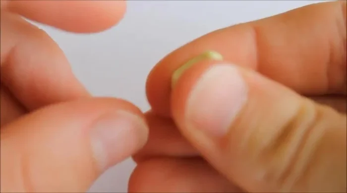 Round the edges by pushing and smoothing them out to make the star more plump.