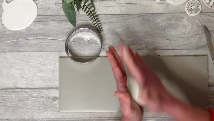 Soften and smooth the clay.