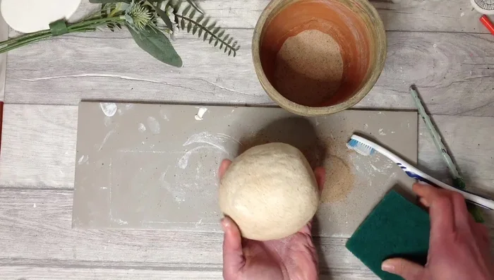 Use a brush, toothbrush, or scourer to create texture.