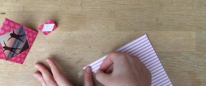 Fold all four corners to the center: Bring each corner to the center point of the square, creating a smaller square.