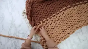 Giant Fluffy Finger Knit Blanket: No Needles Required!