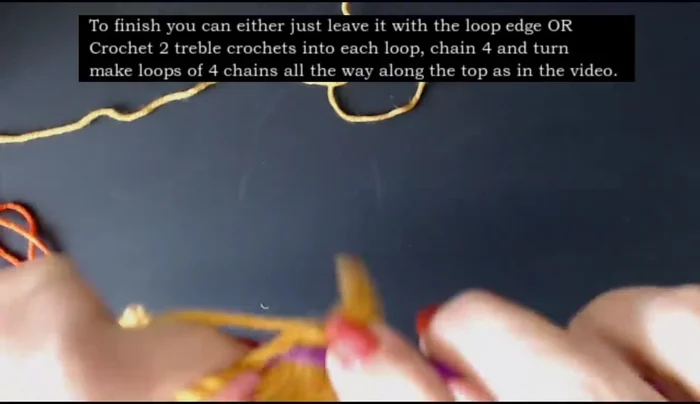 To finish the top edge: Work two treble crochets into each loop, chain four, slip stitch into next chain space. Repeat across.