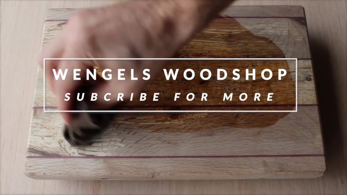 Using plywood as a guide for straight cuts on the bandsaw. This creates two flat, 90-degree sides.