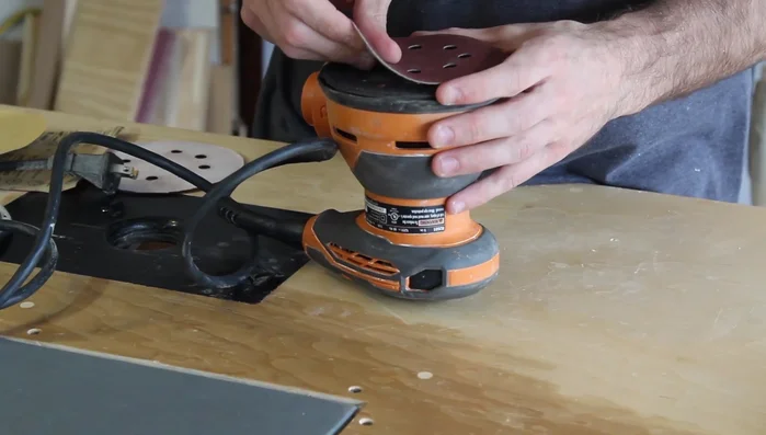 Routing all edges and sanding the cutting board.
