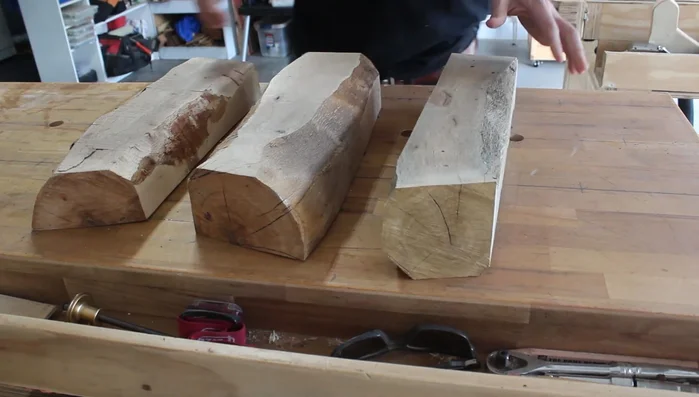 Breaking down logs further using the bandsaw to manageable sizes for the table saw.