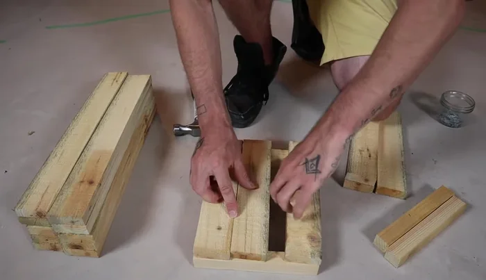 Leave a small gap (about 1/4 inch) between the top end piece and the corner post for a handle (if not cutting a handle).