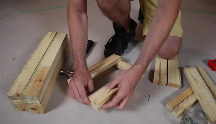 Leave a small gap (about 1/4 inch) between the top end piece and the corner post for a handle (if not cutting a handle).