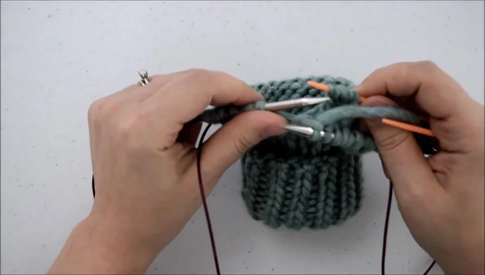 Knit those three stitches.