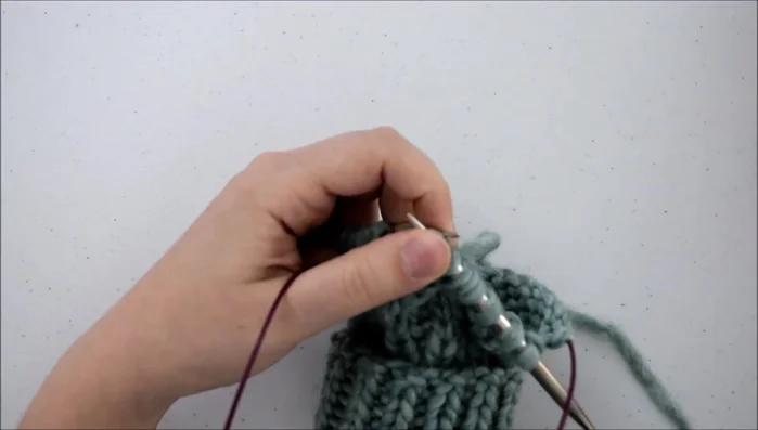 Knit those three stitches.