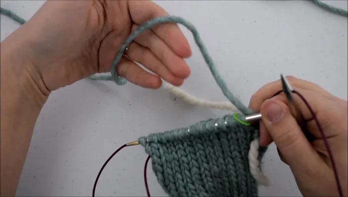 Slip the loop onto your needle and tighten.